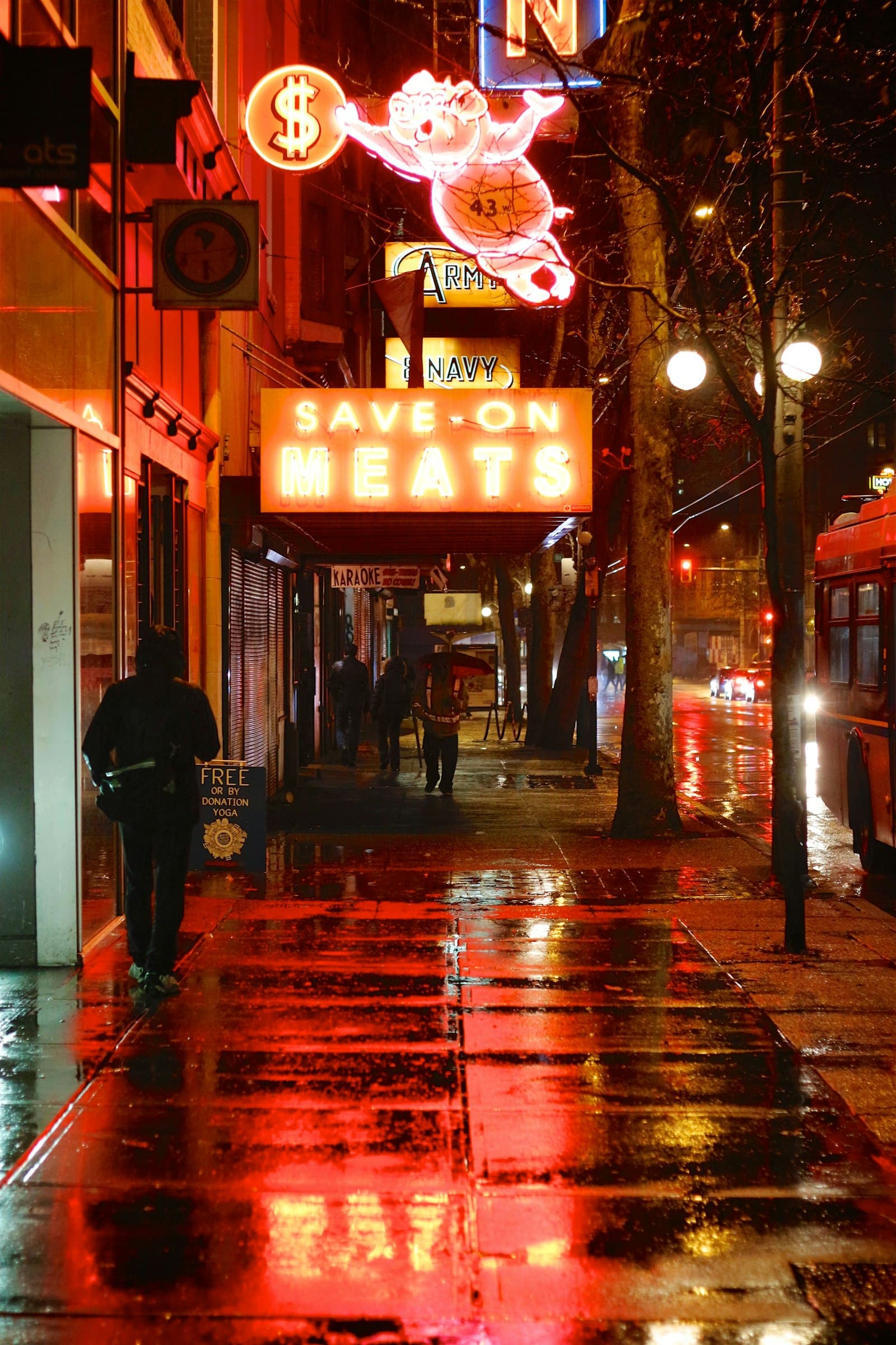 Hastings Street, downtown Vancouver at night — Bluestone is based in the city